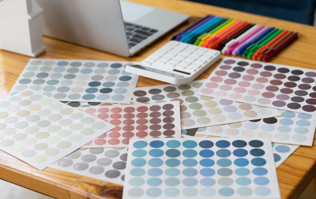 Close up of color swatches on desk in professional designer office.